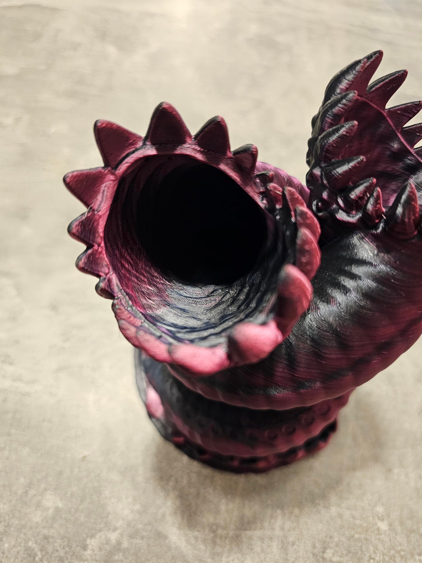 Twisting "worm" dice tower