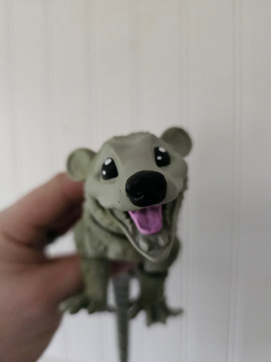 Cute articulated opossum