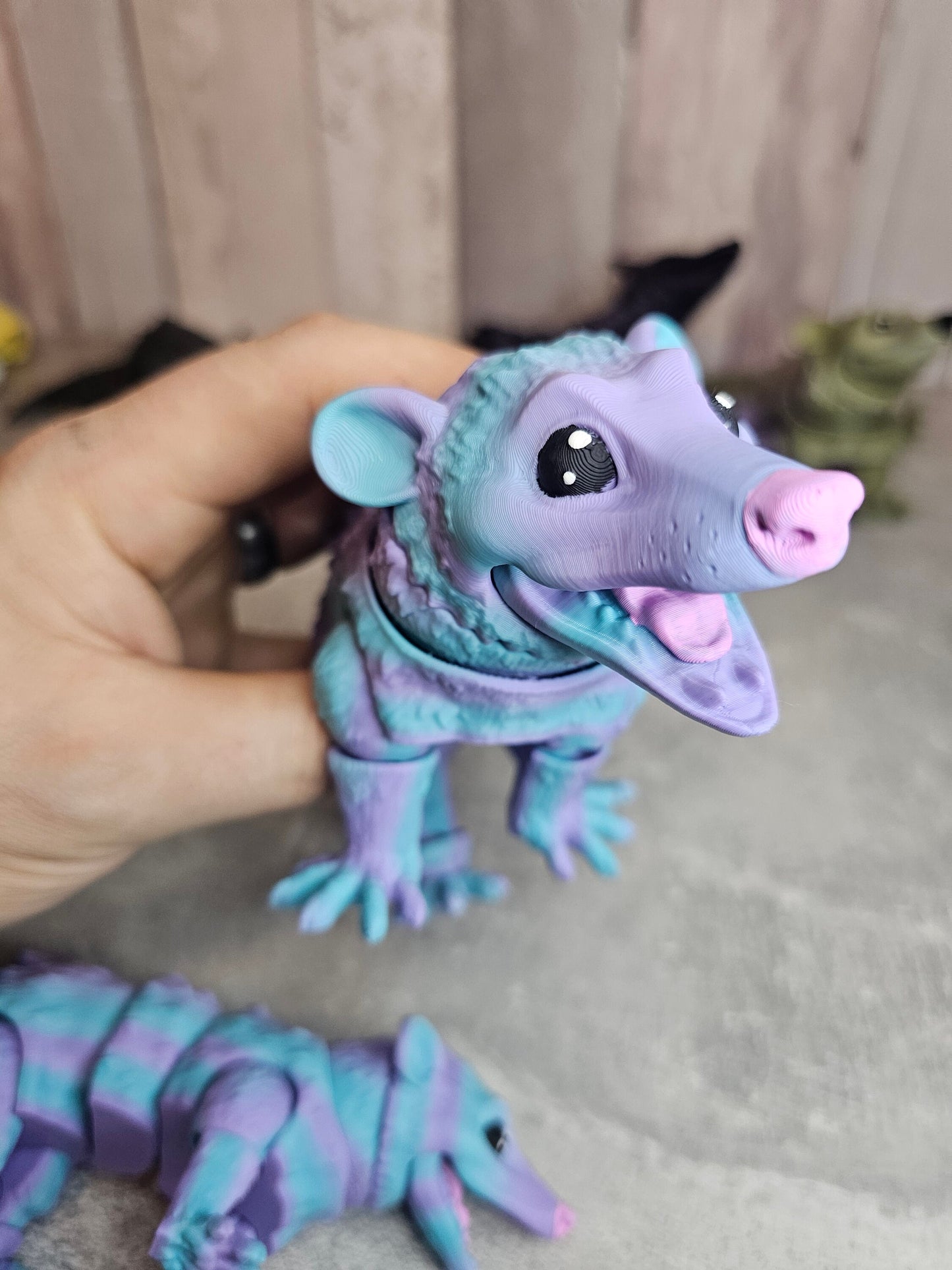 Cute articulated opossum