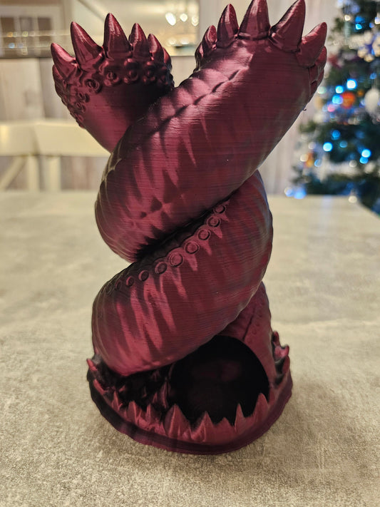 Twisting "worm" dice tower